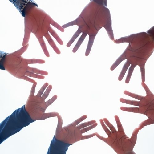 Image of hands in a circle representing circle of influence.