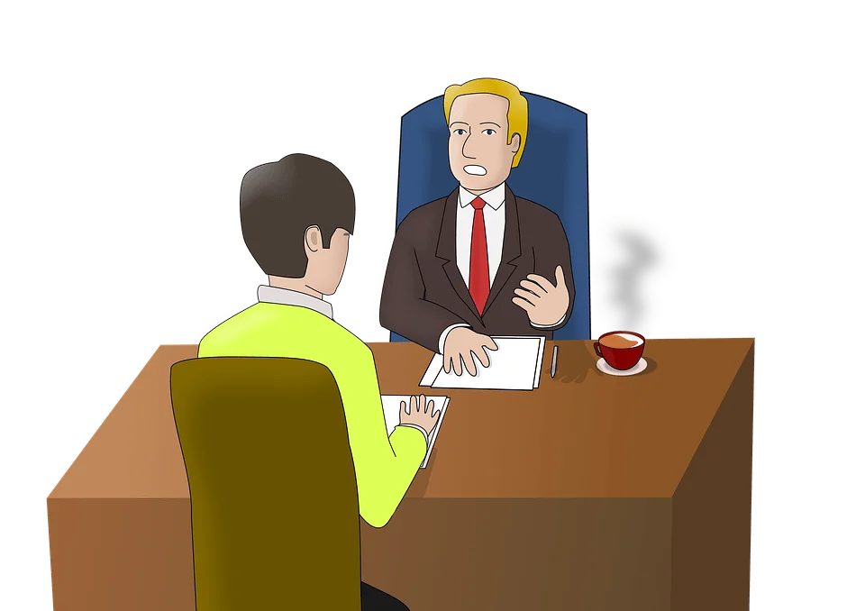 Image of a boss, leader, supervisor, manager interviewing a person to see if they are the right fit for a team.