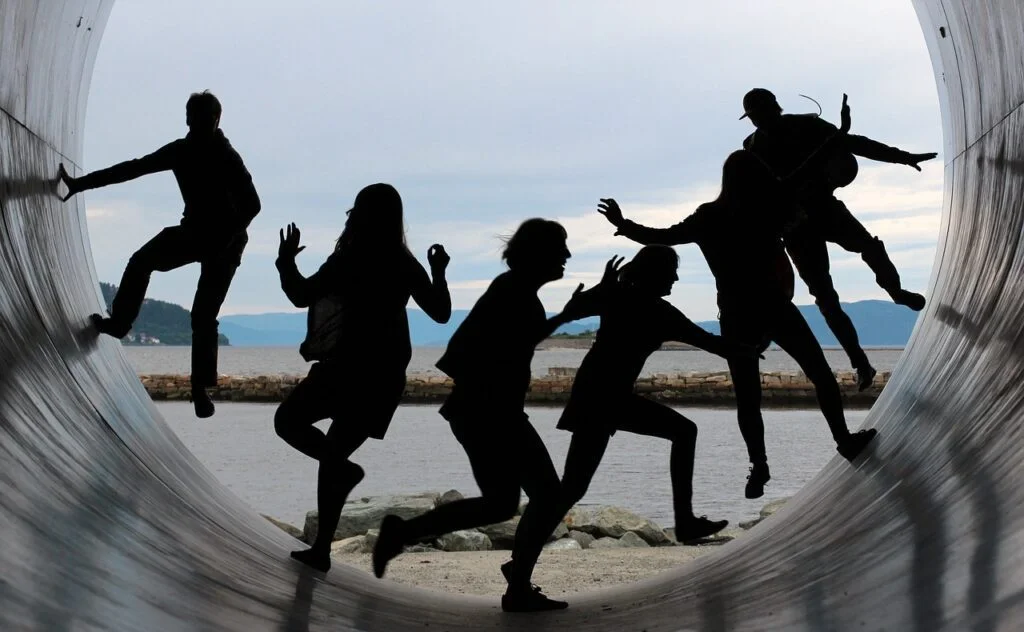 Team inside a pipe playing a 5-minute team building activity.