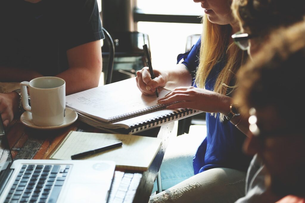 A group in a meeting discussing leadership development planning.