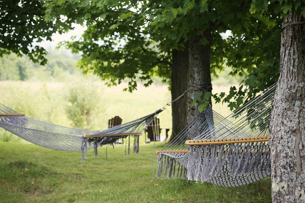 Person resting in hammock to avoid burnout.